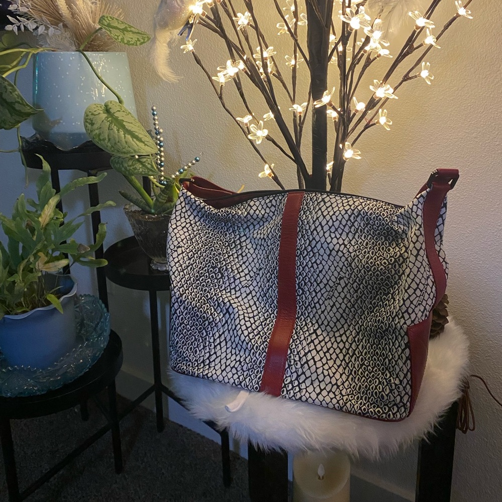 Black and White Lancel Purse With Red Accent